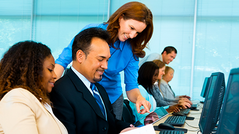 woman coaching worker